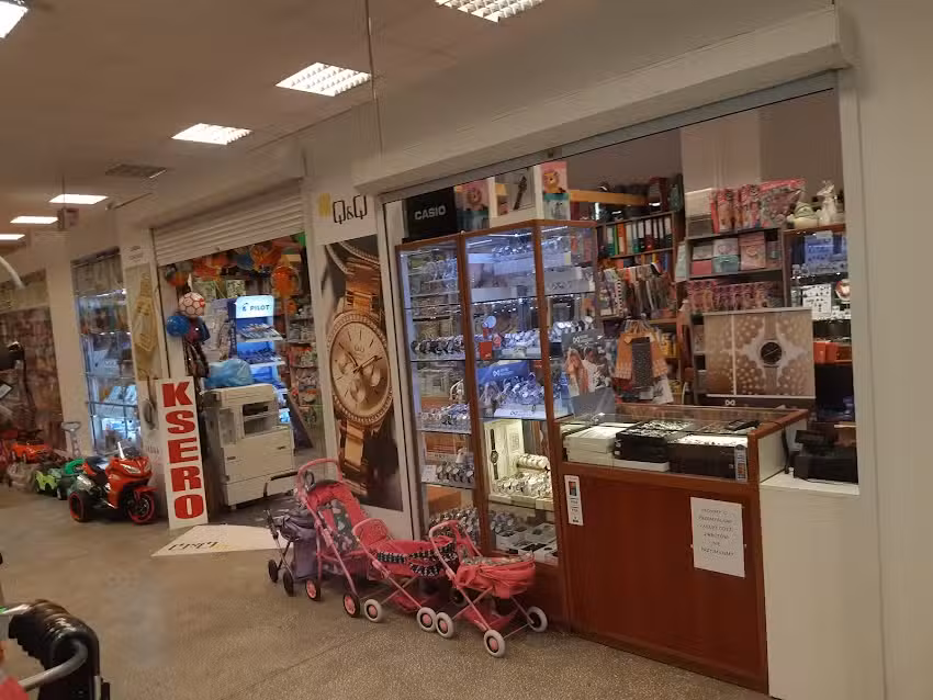 Artykuły papiernicze zabawki i zegarki
